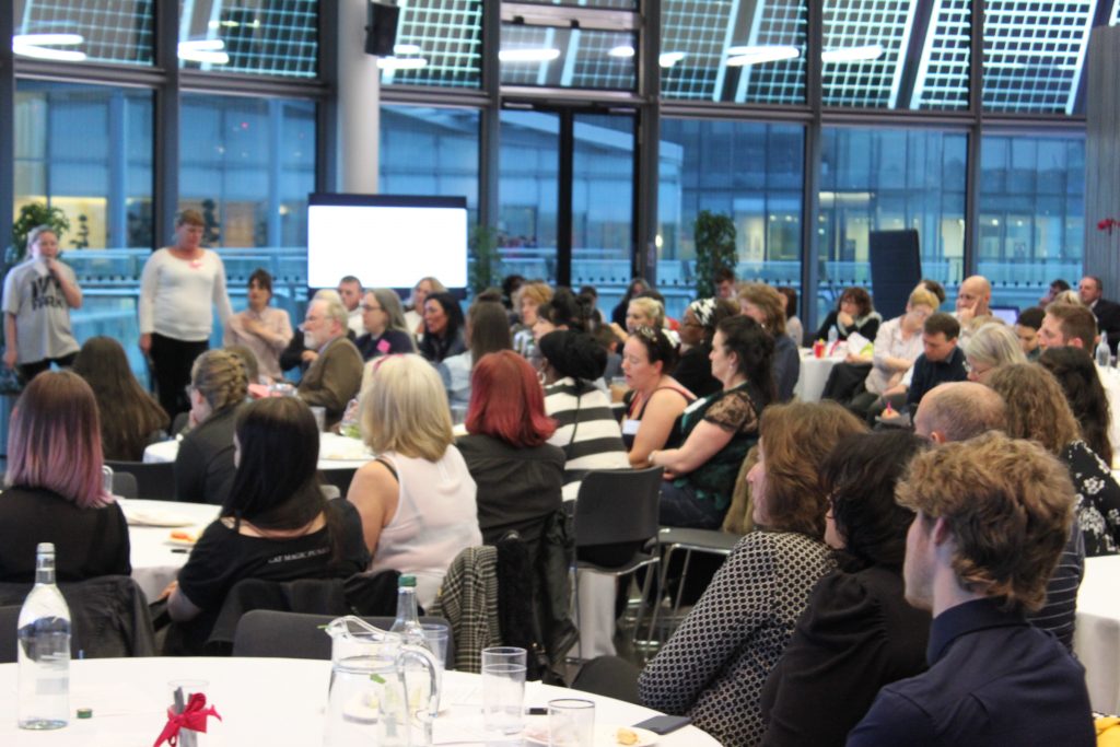 Speakers at City Hall event